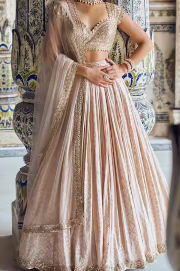Peach Elegance Duo – Paisley Printed Lehenga For Her And Embroidered Kurta Set For Him