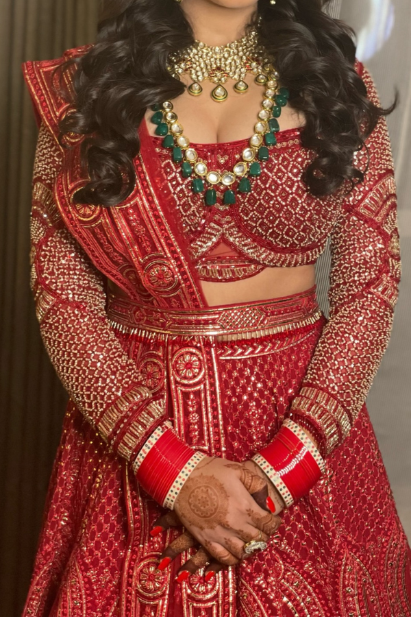 Falguni Shane Peacock Red and gold lehenga set