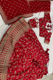 Sabyasachi Red embroidered lehenga with 2 dupattas