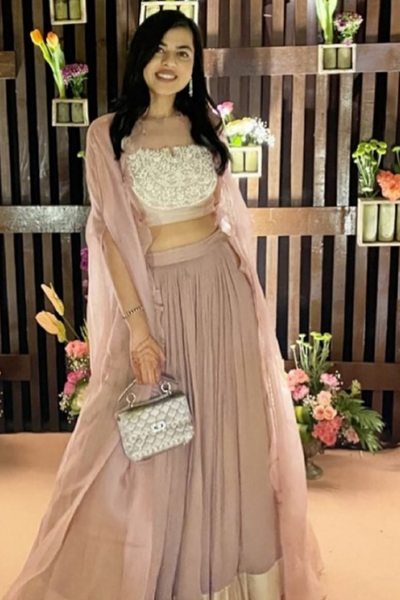 Ridhi Mehra dust pink lehenga with cape