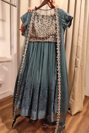 Ridhi Mehra teal lehenga with cape