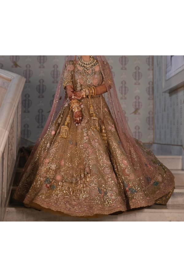 Rimple & harpreet Gold and pink embroidered lehenga