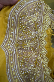 Ridhi Mehra yellow lehenga & cape set