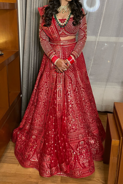 Falguni Shane Peacock Red and gold lehenga set