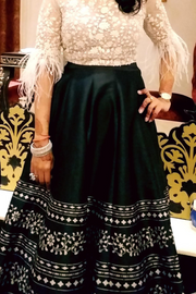 RIDHI MEHRA white top and black skirt set