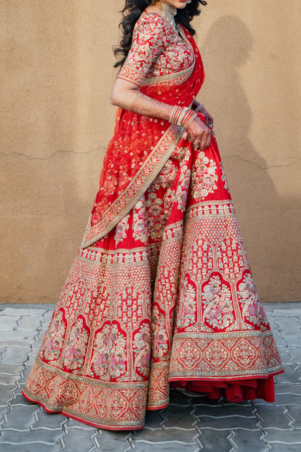 Sabyasachi Bride Donned A Red Tasselled Lehenga At 'Anand Karaj', Styled It  With A Backless 'Choli'
