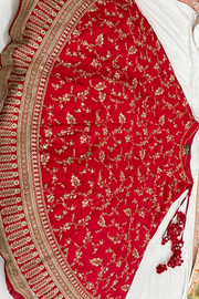 Sabyasachi Red embroidered lehenga with 2 dupattas