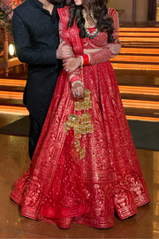 Falguni Shane Peacock Red and gold lehenga set