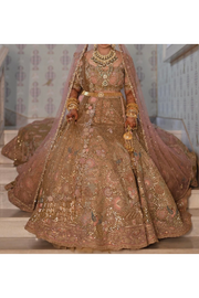 Rimple & harpreet Gold and pink embroidered lehenga