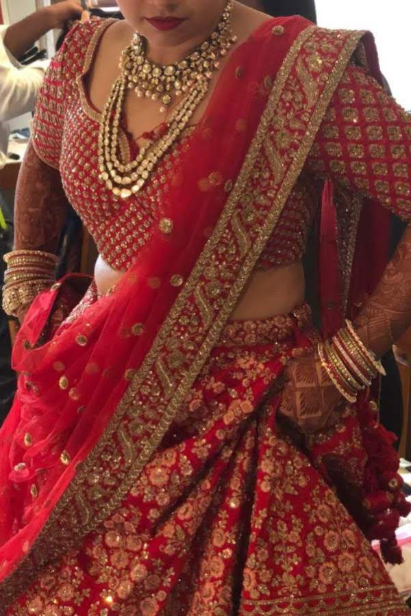 Sabyasachi red bridal embroidered lehenga