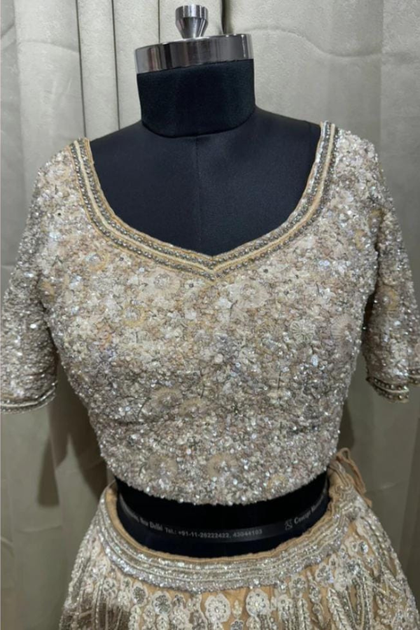 Beige Embroidered heavy lehenga set