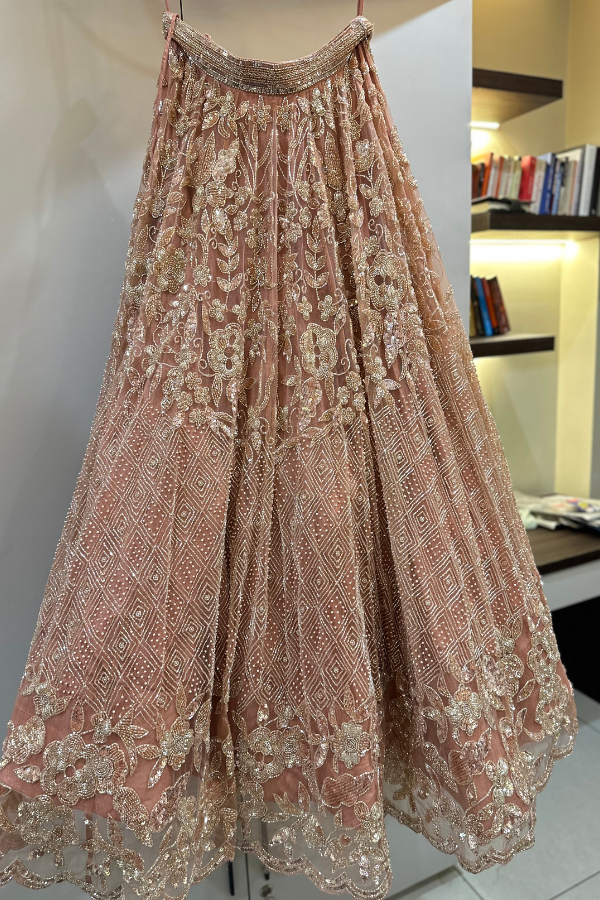 Swish by Dolcy & Simran Rose Gold Embellished lehenga