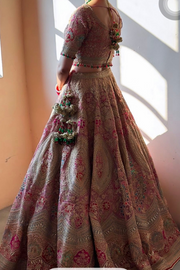 Rimple and harpreet pink embroidered lehenga