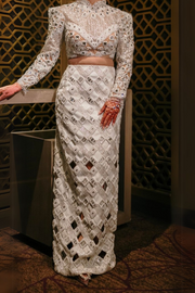 Manish Malhotra White embellished skirt with a heavy blouse