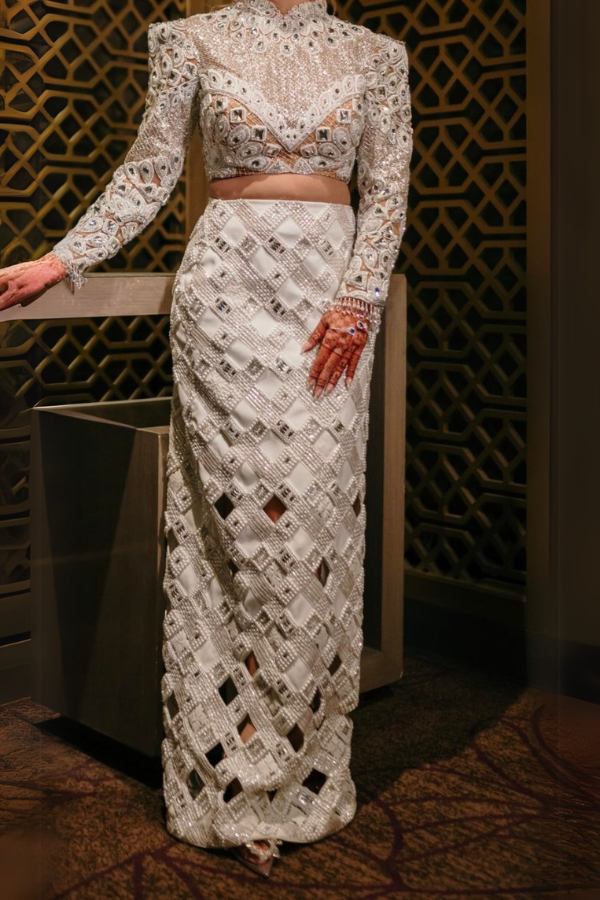 Manish Malhotra White embellished skirt with a heavy blouse