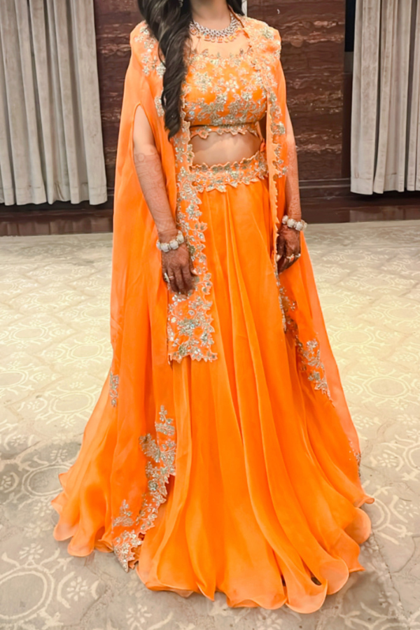 Anushree reddy orange lehenga cape set