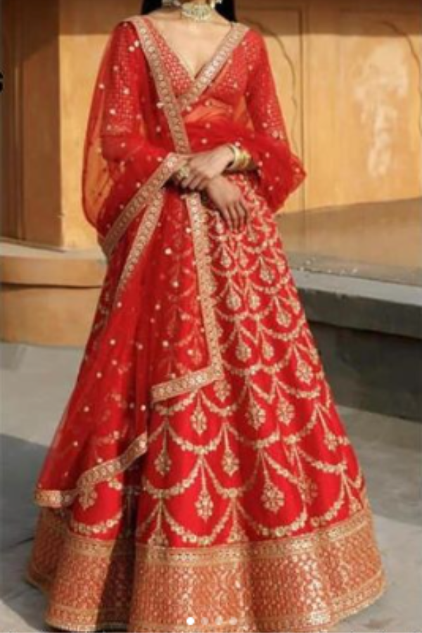 Dulhan in Red Lehenga Elegance: Sabyasachi-Inspired Royal Baggi Collection,  शादी का लहंगा - JMS Studio, Surat | ID: 2853090439933