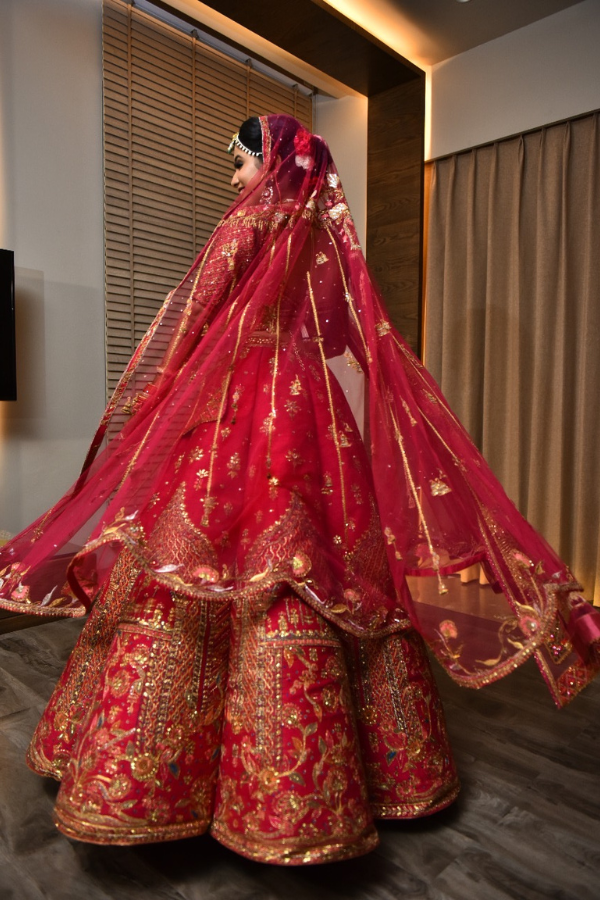 SULAKSHANA MONGA Red bridal kalidar lehenga set