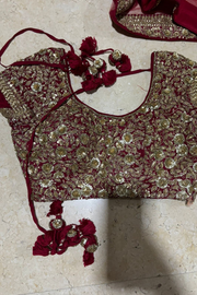 Sabyasachi dark red embroidered lehenga set