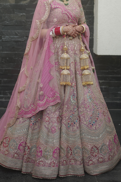 Rimple and harpreet pink embroidered lehenga