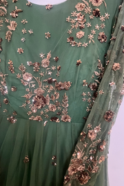 Astha Narang Green net anarkali set