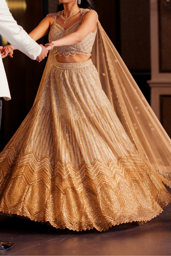 Isa by Dolly Wahal Light gold ombre lehenga