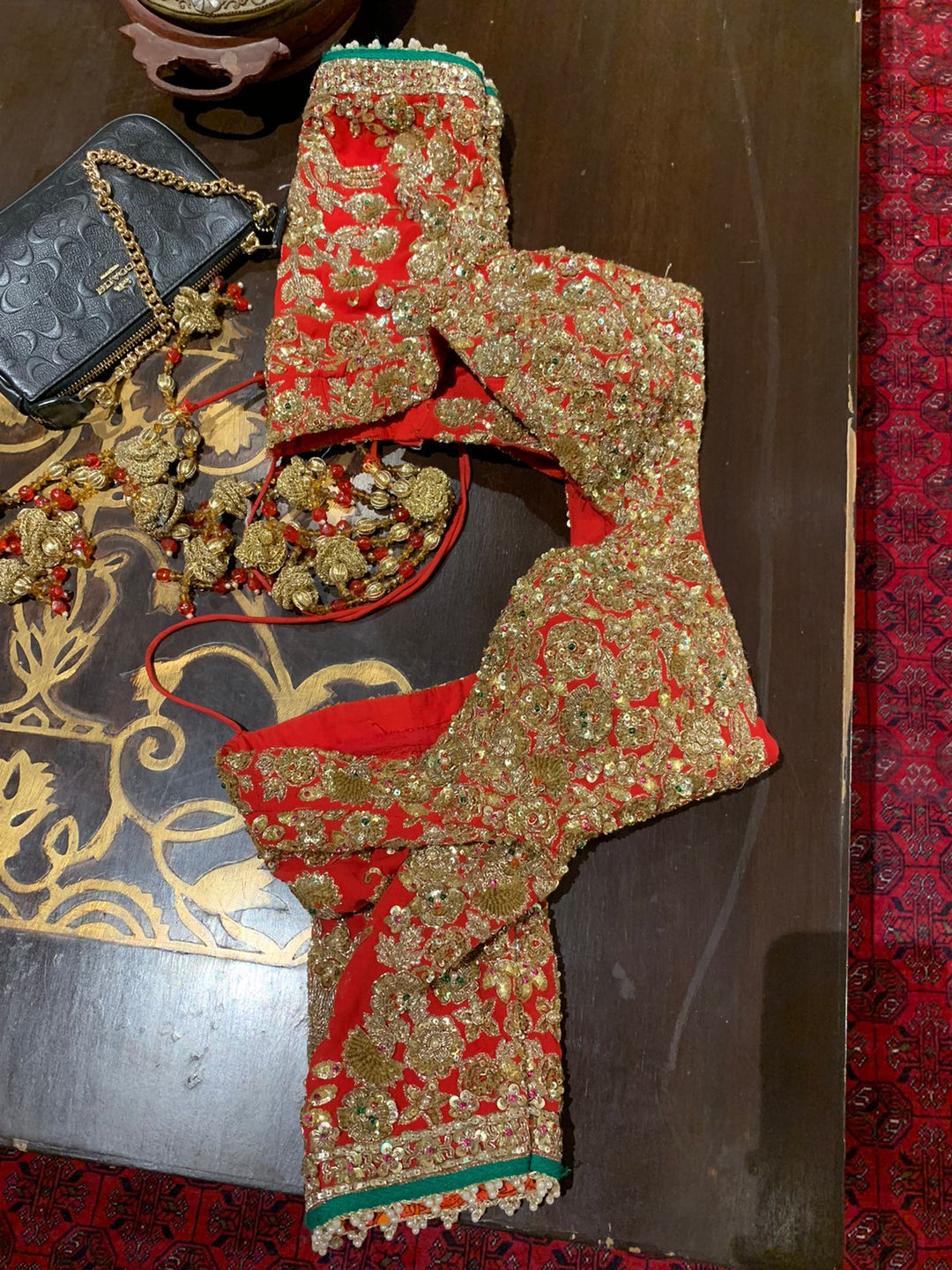 Rimple & Harpreet Red & Gold Embroidered Lehenga Set