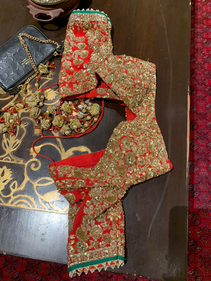 Rimple & Harpreet Red & Gold Embroidered Lehenga Set