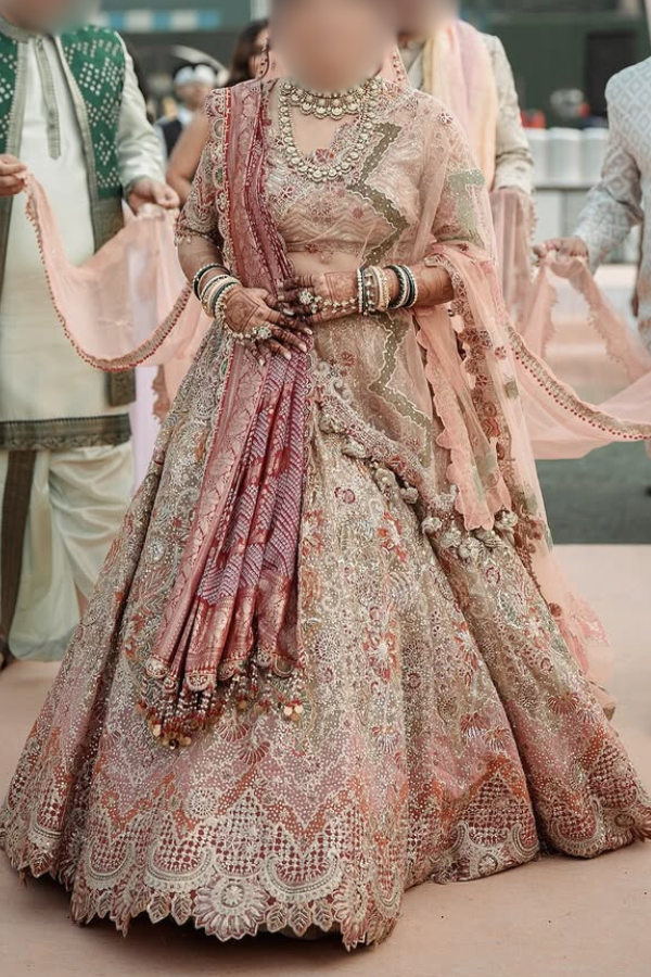 Rimple and harpreet beige embroidered lehenga