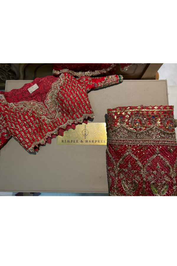 Rimple & Harpreet Red Bridal Lehenga Set