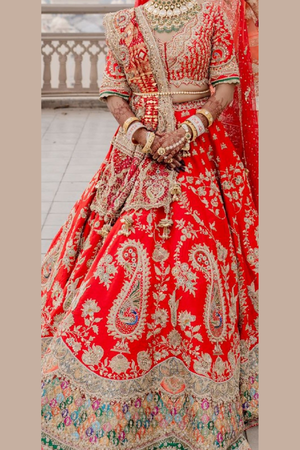 Rimple & Harpreet Red Bridal Lehenga Set