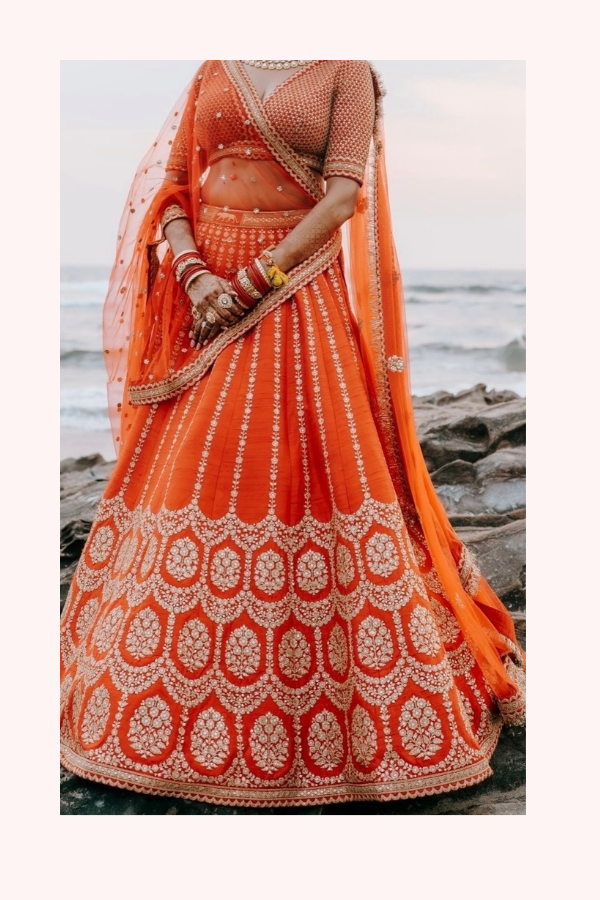 Sabyasachi Red & Gold Embroidered Bridal Lehenga Set