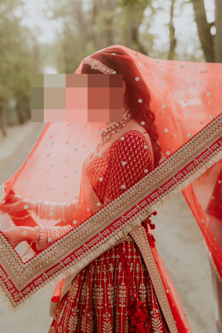Sabyasachi Red Bridal Embroidered Lehenga Set