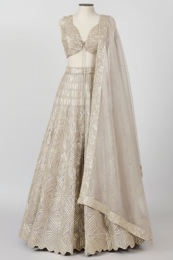 Varun & Nidhika Champagne Gold Embellished Lehenga Set