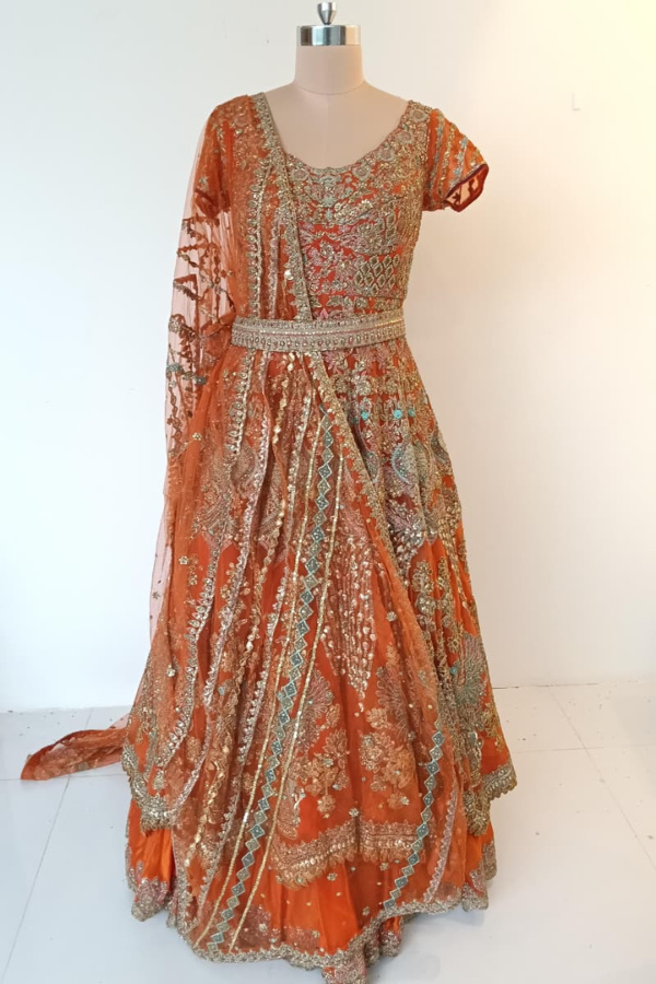 Rimple & Harpreet Orange Embroidered Bridal Lehenga Set