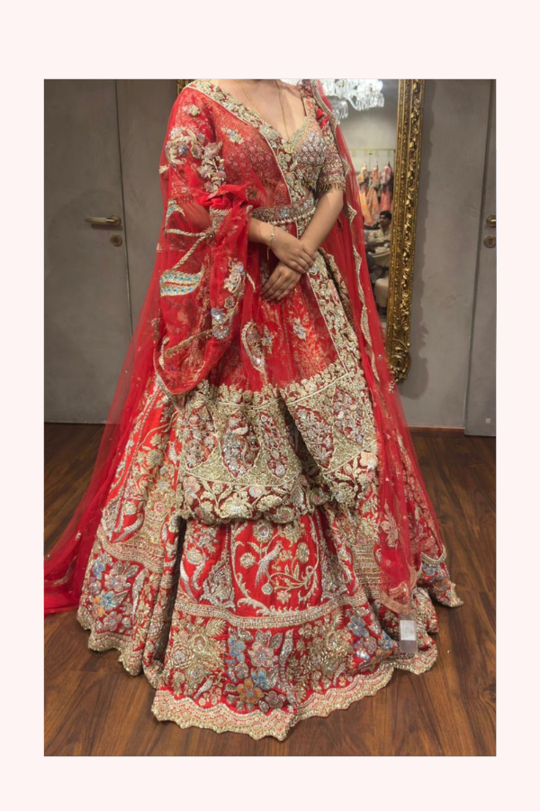 Rimple & Harpreet Red Embroidered Bridal Lehenga Set