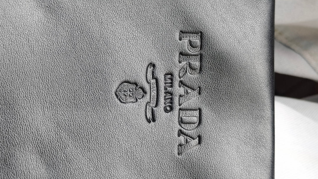 Prada Woven Leather Clutch