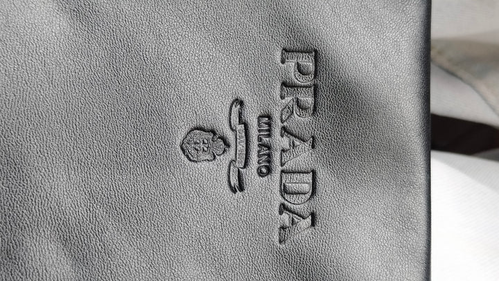 Prada Woven Leather Clutch