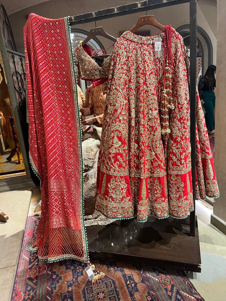 Rimple & Harpreet Red & Gold Embroidered Lehenga Set