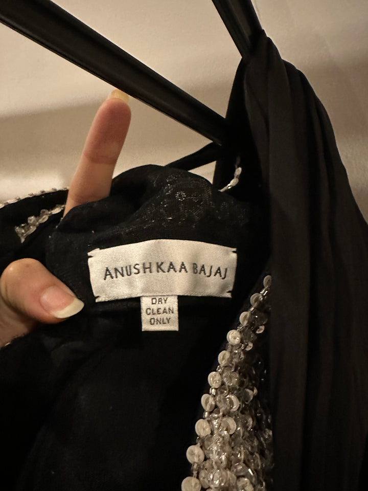 Anushka Bajaj Black Draped Satin Saree
