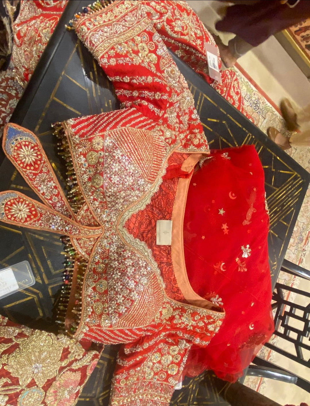 Rimple & Harpreet Red Embroidered Bridal Lehenga Set