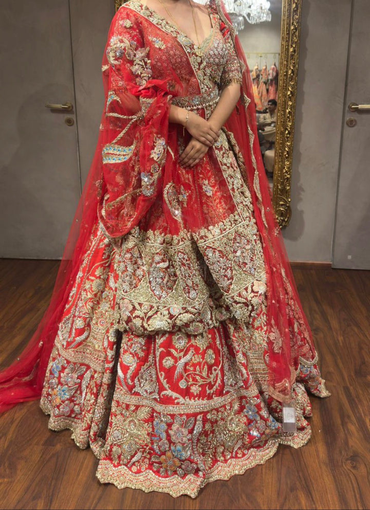 Rimple & Harpreet Red Embroidered Bridal Lehenga Set