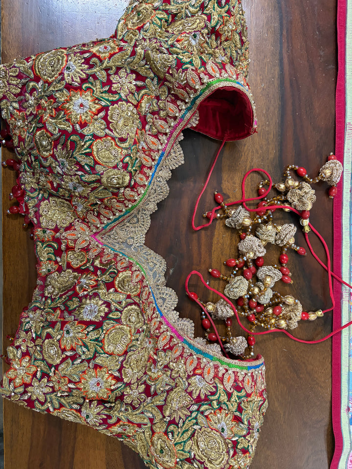 Rimple & Harpreet Red Embroidered Bridal Lehenga Set