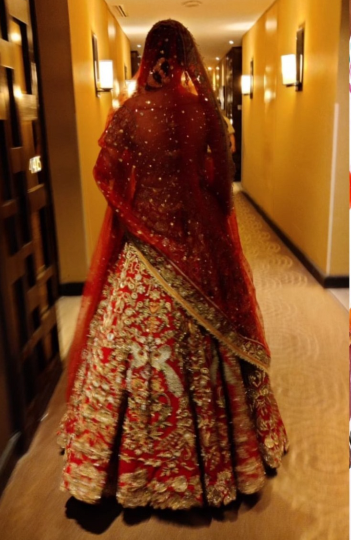 Rimple & Harpreet Red Embroidered Bridal Lehenga Set