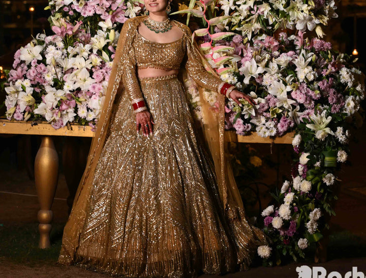 Isa by Dolly Wahal Gold Embellished Lehenga Set