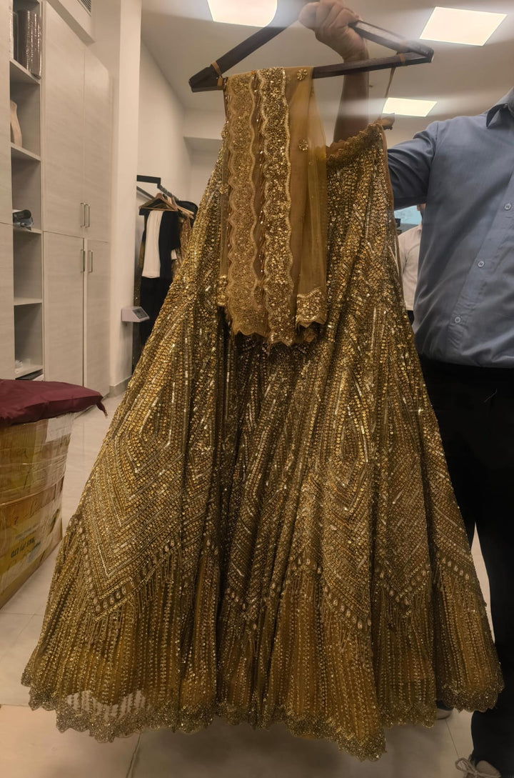 Isa by Dolly Wahal Gold Embellished Lehenga Set