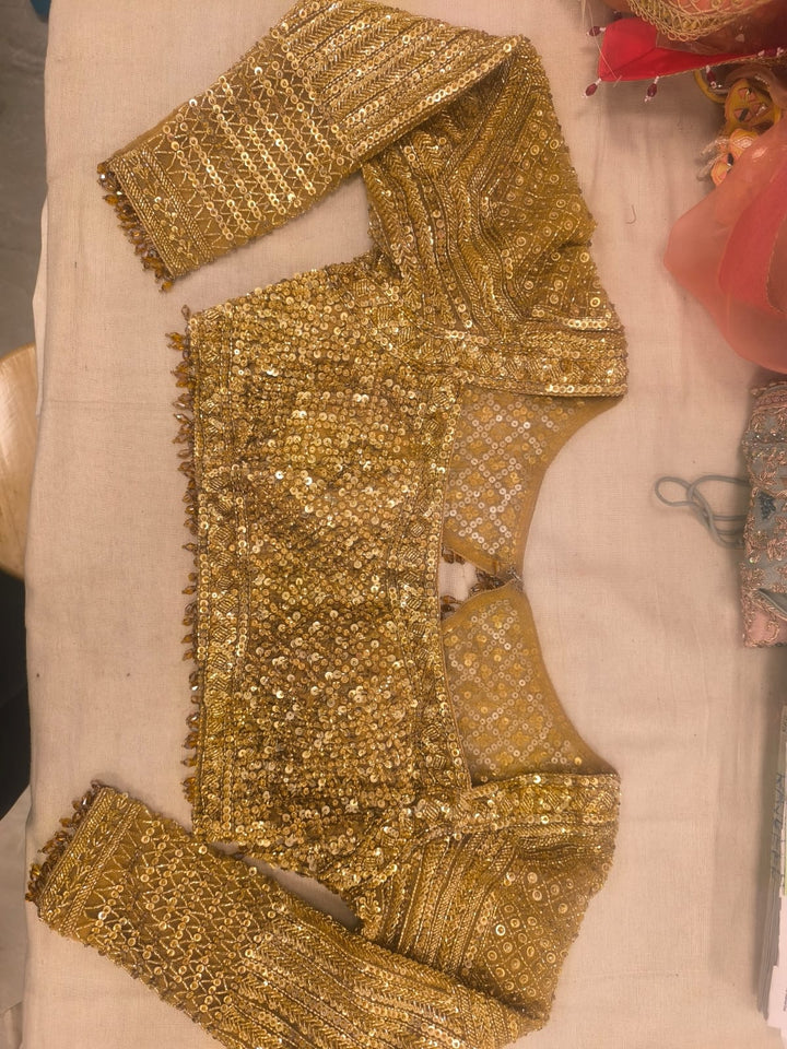 Isa by Dolly Wahal Gold Embellished Lehenga Set