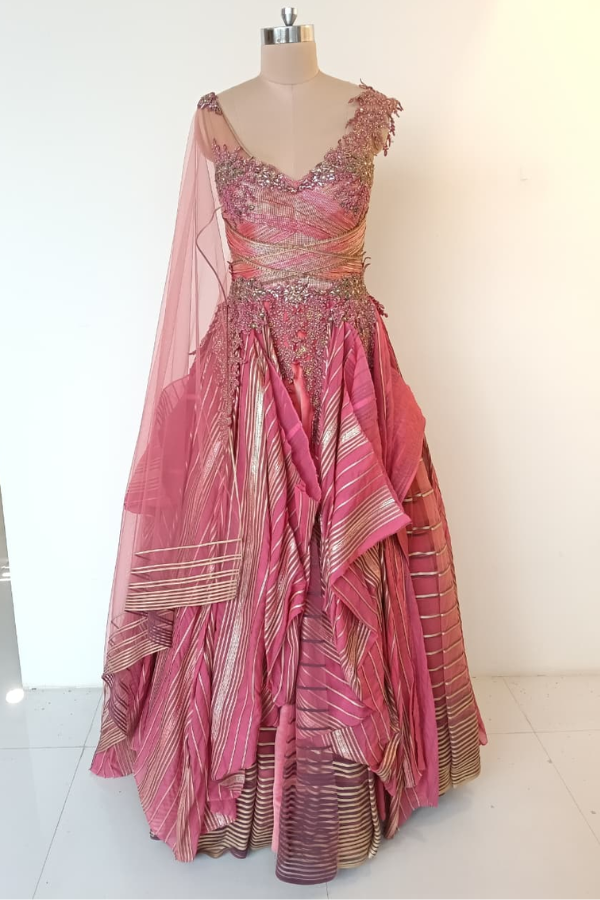 Shanthanu and Nikhil pink layered gown
