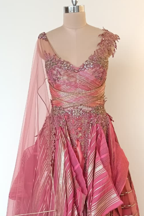 Shanthanu and Nikhil pink layered gown