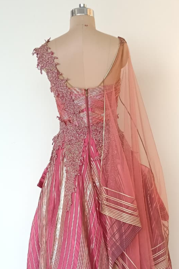 Shanthanu and Nikhil pink layered gown